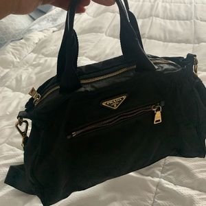 Used authentic PRADA hand and crossbody bag .